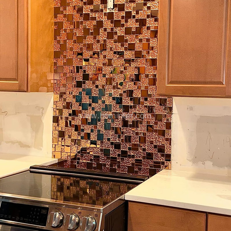 Rose Gold Glass and Metal Backsplash in Kitchen